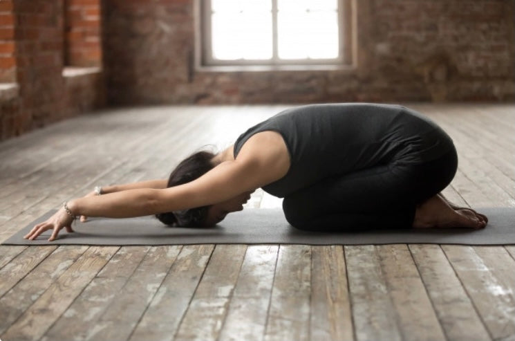 7 Yoga Poses That'll Help You Fall Asleep Faster